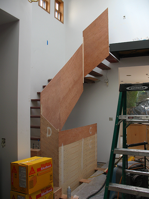 Physical mockup of stair rails, showing ascent to the upper story. Image: Mark English Architects