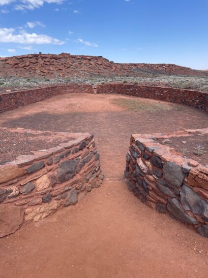 Elongated stone-walled enclosure in desert setting used for ancient ball games